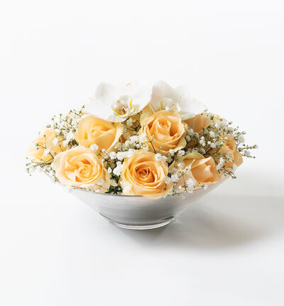 Fersken rosedekorasjon med orkideklokker Fersken rosedekorasjon med orkideklokker